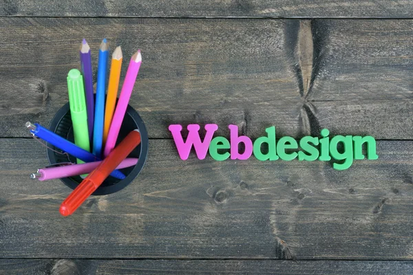 Webdesign op houten tafel — Stockfoto