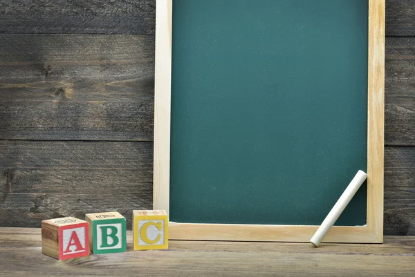 Junta escolar y palabra ABC — Foto de Stock