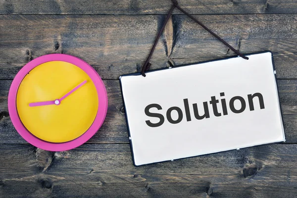 Solution sign on wooden table — Stock Photo, Image