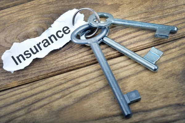 Key with message Insurance — Stock Photo, Image