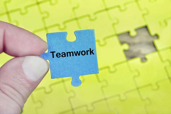 Puzzle s slovo týmové práce — Stock fotografie