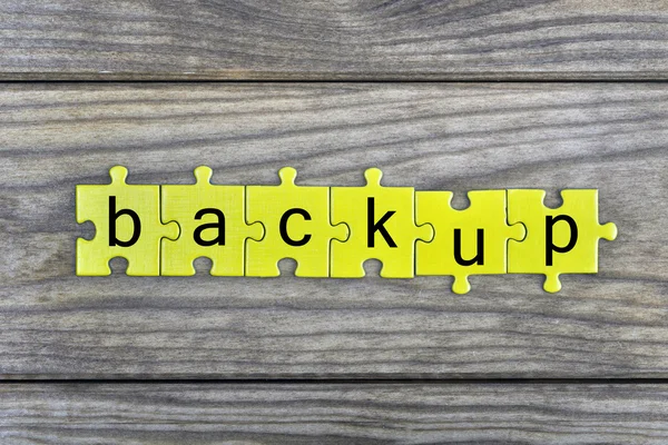 Puzzle com a palavra Backup — Fotografia de Stock
