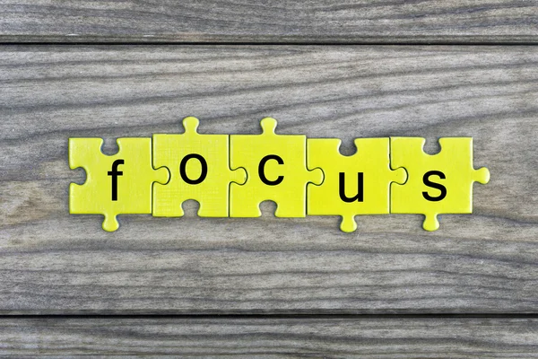 Puzzel met woord Focus — Stockfoto