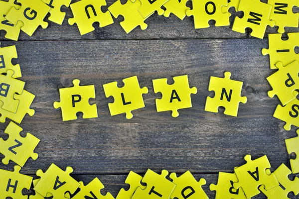 Puzzle con la palabra Plan — Foto de Stock