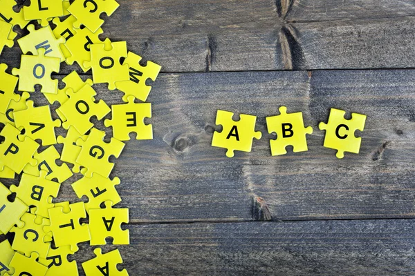 Puzzle com palavra ABC — Fotografia de Stock