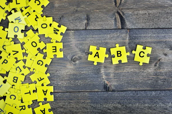 Puzzel met woord Abc — Stockfoto