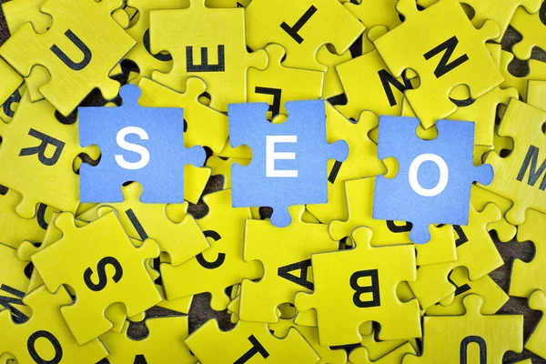 Puzzle with word SEO — Stock Photo, Image
