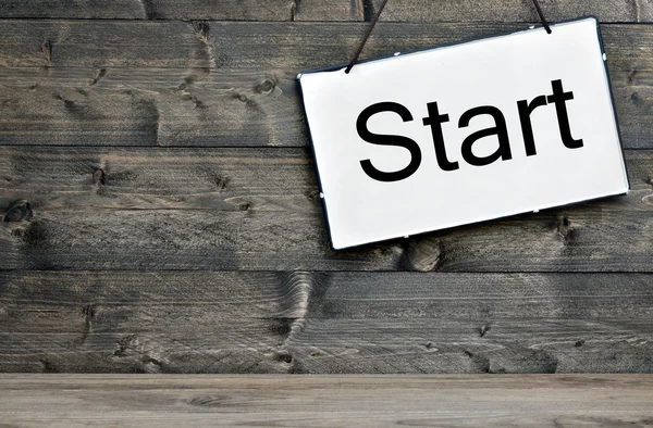 Start op houten tafel — Stockfoto