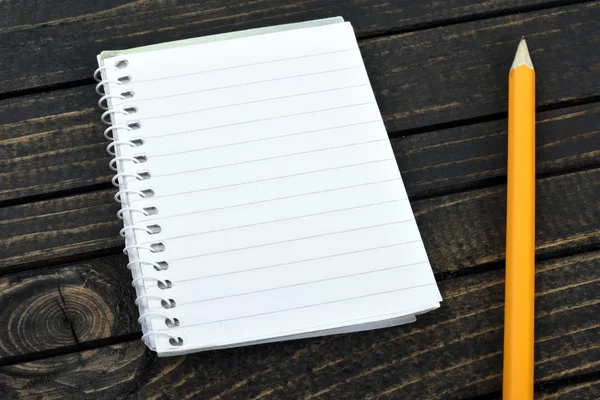 Notepad on table — Stock Photo, Image