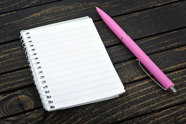 Notepad on table — Stock Photo, Image