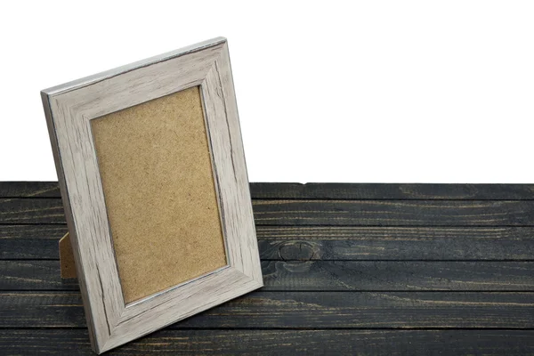 Photo frame on table — Stock Photo, Image