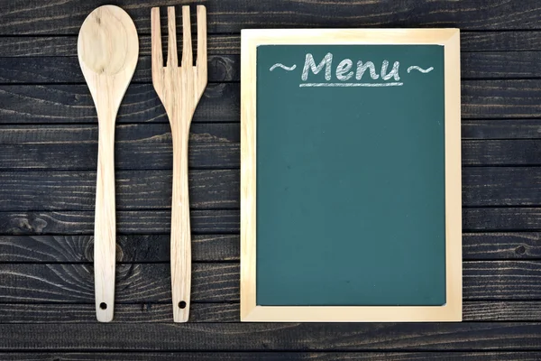 Tenedor y cuchara en la mesa — Foto de Stock