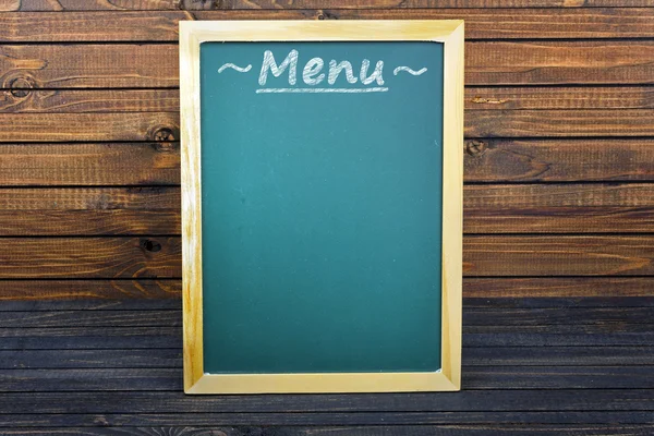 Tablero de menú en la mesa — Foto de Stock