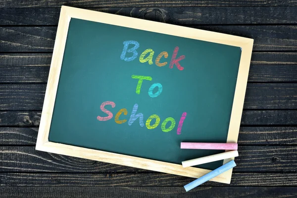 Back to school text on school board — Stock Photo, Image