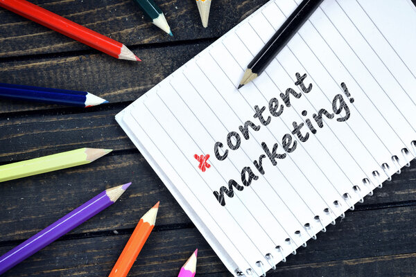 Contact Marketing text on notepad 