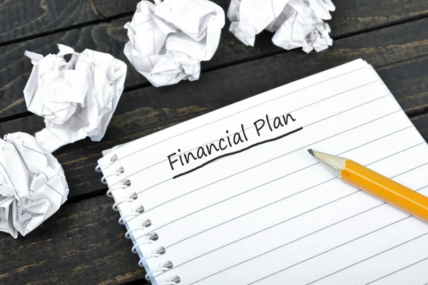 Financiële Plan tekst in Kladblok — Stockfoto
