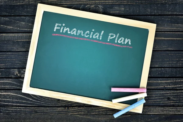 Financial plan text on school board — Stock Photo, Image