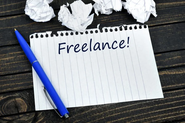 Testo freelance su blocco note — Foto Stock