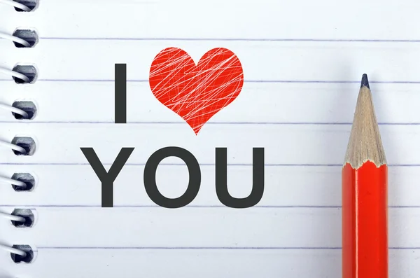 I love you text on блокнот and pencil — стоковое фото