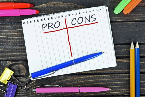 Pro and Cons text on notepad — Stock Photo, Image