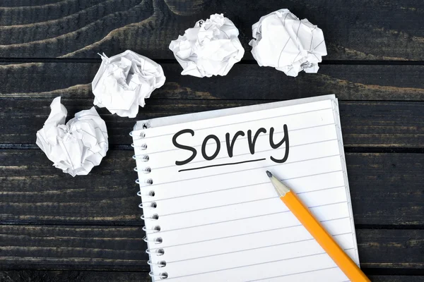 Sorry text on notepad — Stock Photo, Image