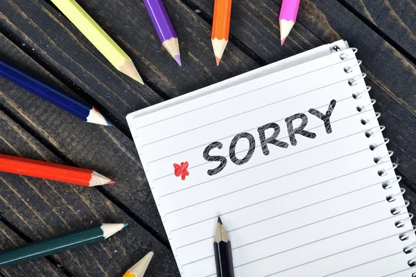 Sorry text on notepad — Stock Photo, Image