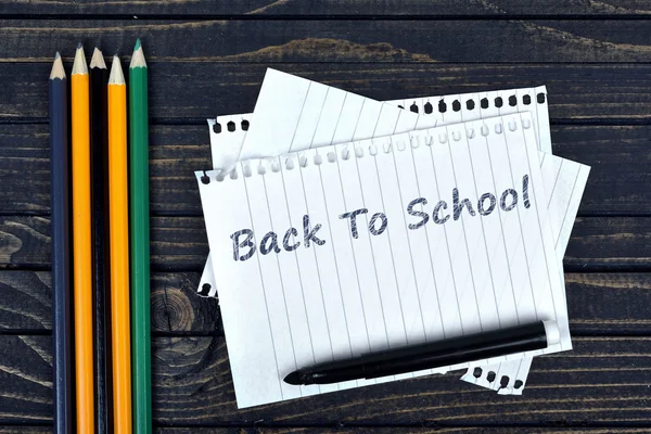 Back to school text on notepad and office tools — Stock Photo, Image