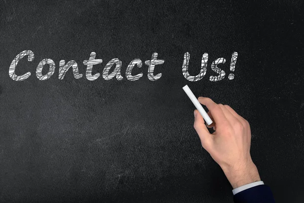 Contact Us text on black board — Stock Photo, Image