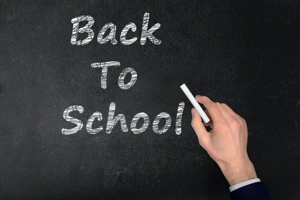 Powrót do szkoły tekstu na czarny deska — Zdjęcie stockowe
