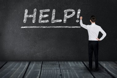 Kara tahta üzerinde yardım metni