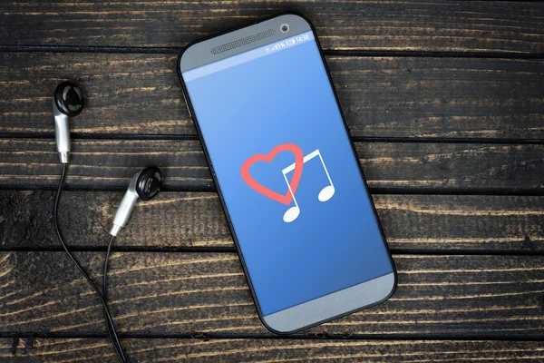 Love music on phone screen — Stock Photo, Image