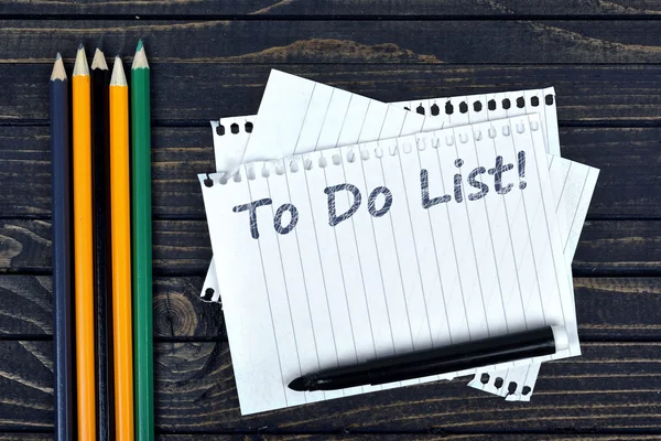 Para fazer lista no bloco de notas e ferramentas de escritório — Fotografia de Stock