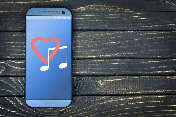Liefde muziek op telefoon scherm — Stockfoto