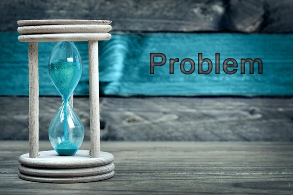 Problem text and hourglass on table — Stock Photo, Image