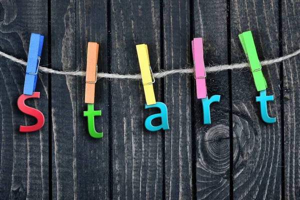 Start word hanging on clips — Stock Photo, Image