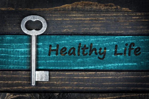 Healthy life text and old key — Stock Photo, Image