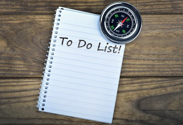 To Do List and compass on wooden table — Stock Photo, Image