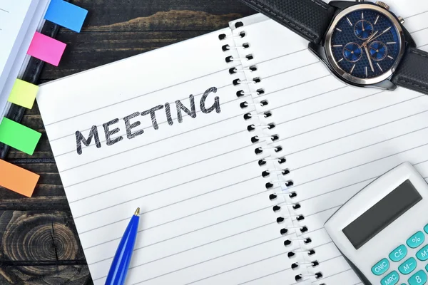 Meeting text on notepad and watch — Stock Photo, Image