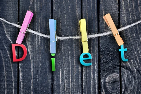 Diet word hanging on clips — Stock Photo, Image