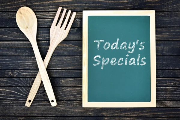 Today\'s Specials text on green board with fork and spoon