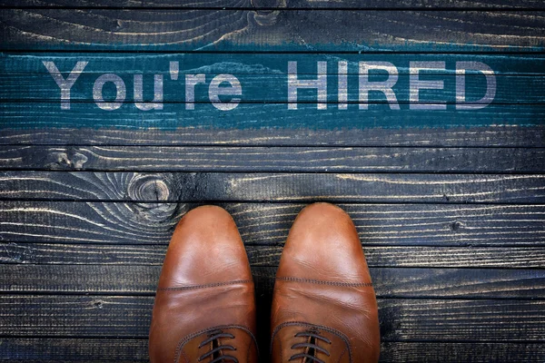 You're hired message and business shoes — Stock Photo, Image