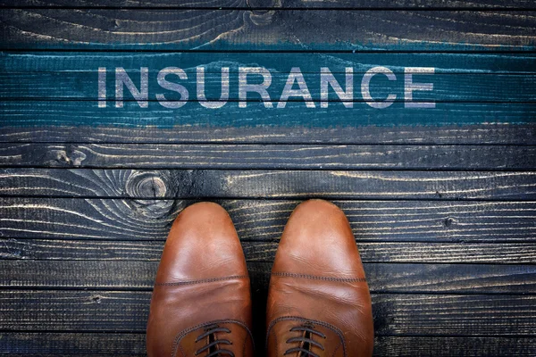 Insurance message and business shoes — Stock Photo, Image