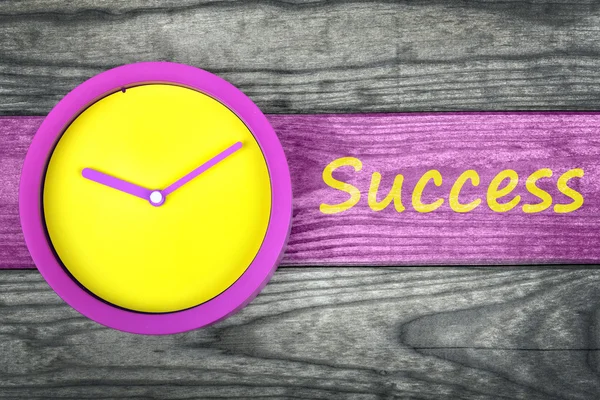 Success message and clock on table — Stock Photo, Image