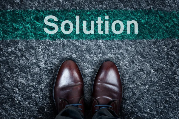 Solution message on asphalt — Stock Photo, Image