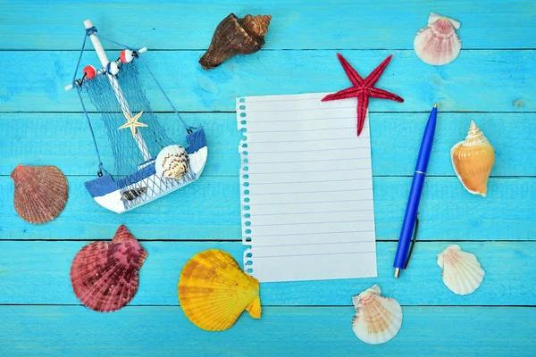 Toy ship and notepad — Stock Photo, Image