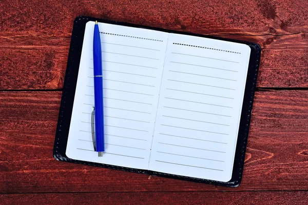 Notepad on table — Stock Photo, Image