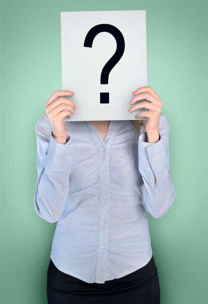 Woman cover face with question board