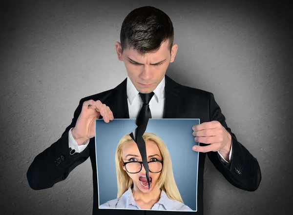 Man breaking woman picture — Stock Photo, Image