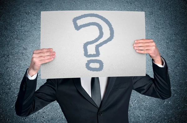 Man cover face with question board — Stock Photo, Image