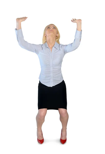 Business woman lifting something — Stock Photo, Image